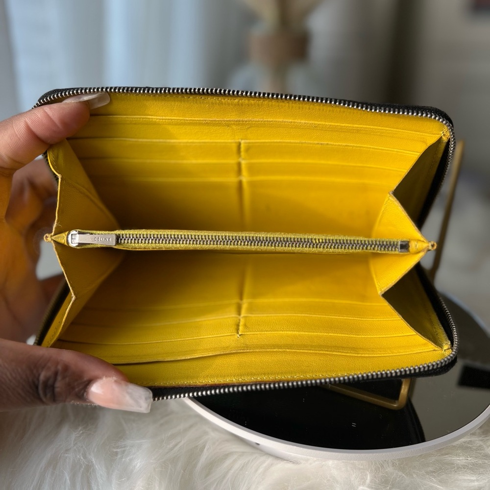 CELINE Pre-loved Black Zip Around Wallet with Silver Hardware 🍋